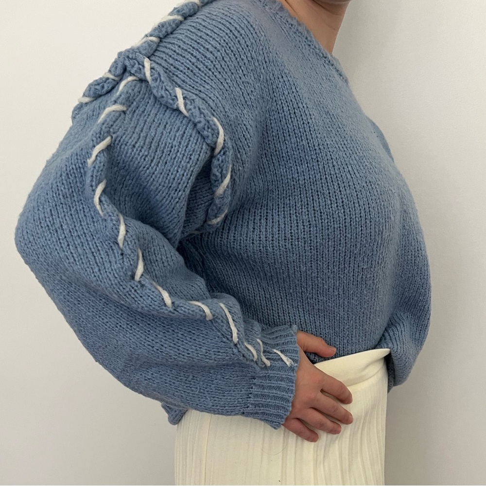 Blue winter top with white trimming